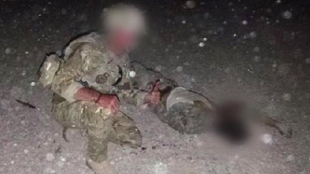 Image 4: RAF Serviceman Posing with Dead Taliban (Obtained by BBC)