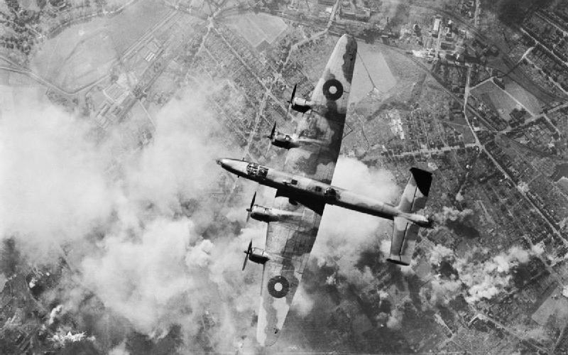 A_Handley_Page_Halifax_of_RAF_Bomber_Command_over_the_target_during_a_daylight_raid_on_the_oil_refinery_at_Wanne-Eickel_in_the_Ruhr_12_October_1944