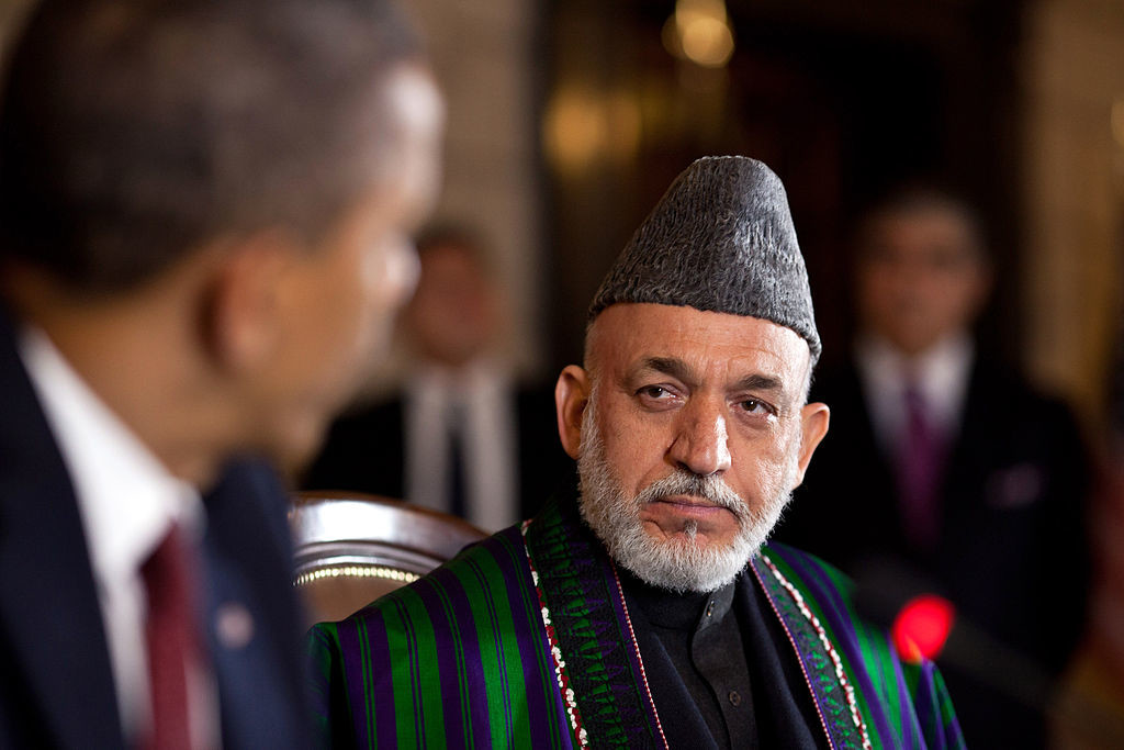 Hamid_Karzai_listens_to_Barack_Obama_in_Kabul_2012