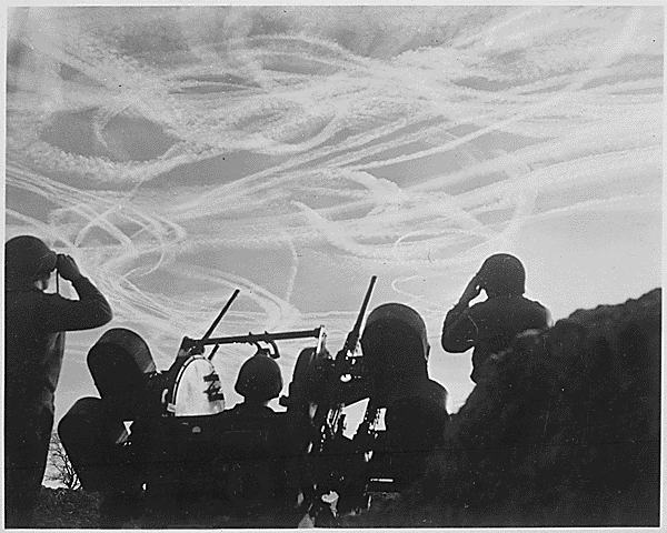 M-51 Anti-aircraft Battery looking up at a Christmas Day dog-fight. Near Puffendorf, Germany. 12.25.1944