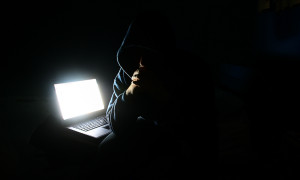 Attribution and Secrecy in Cyberspace