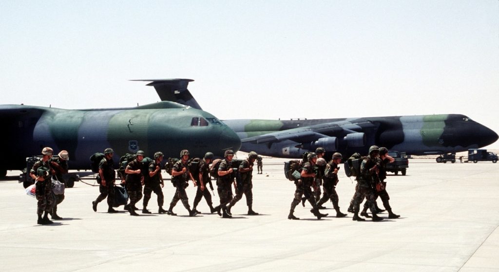 fig3-troops-cross-airfield