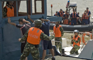 A White Hull Approach to Taming the Dragon: Using the Coast Guard to Counter China