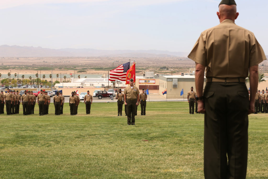 Maj. Gen. David H. Berger dismisses a formation of Marines at the end of a Navy Cross award ceremony