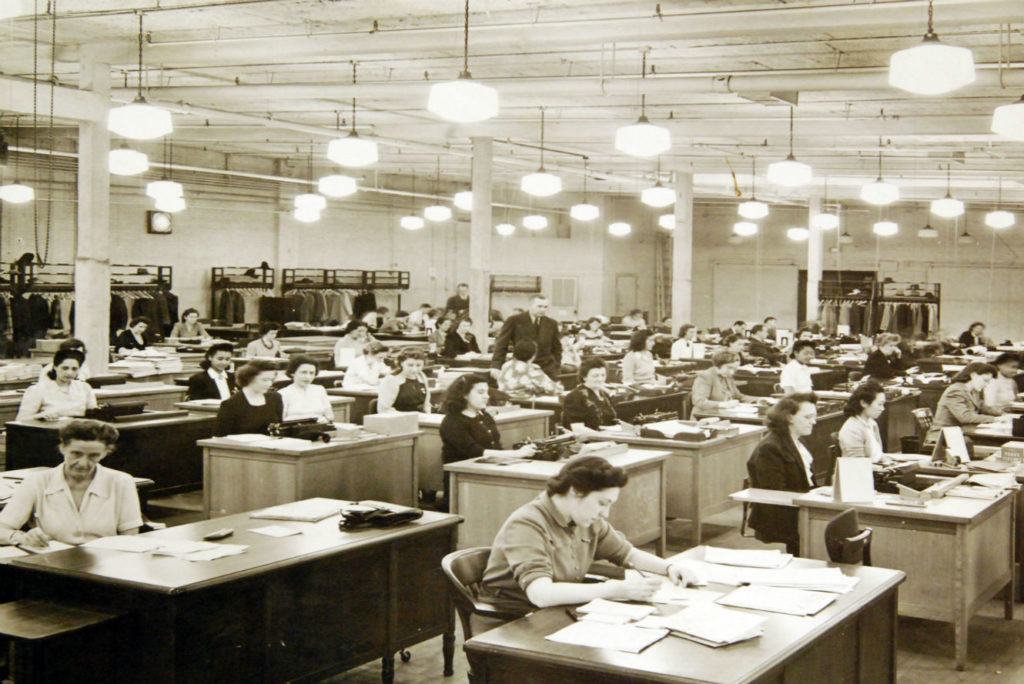 War_Production_Drive_correspondence_workers_housed_in_former_skating_rink_WWII_(33948936933)FINAL