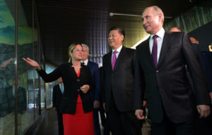 Russia as a Hurricane, China as Climate Change: Different Ways of Information Warfare