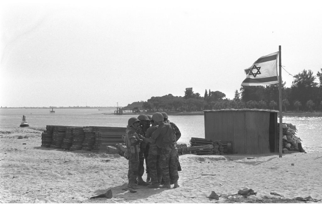 Six_Day_War._An_Israeli_troop_carrier_on_the_east_bank_of_the_Suez_Canal_opposite_Ismailia._June_1967._D326-110
