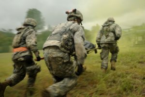 Flying Dirty: Unmanned Casualty Evacuation on the Contaminated Battlefield