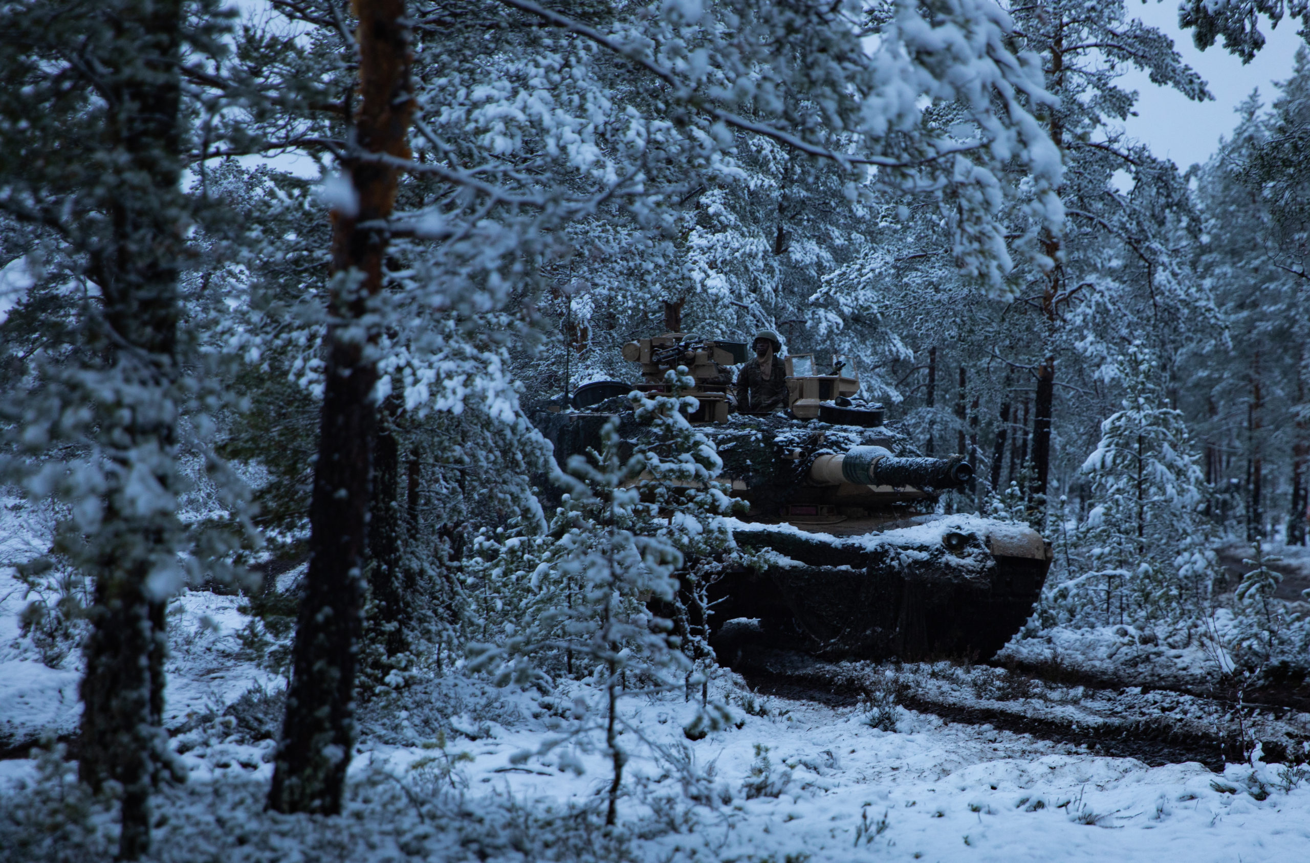 US and Finnish Forces train together in Finland with a tank