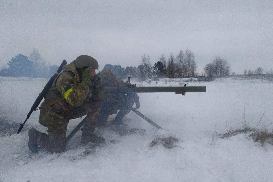 A Ukrainian soldier fights during winter