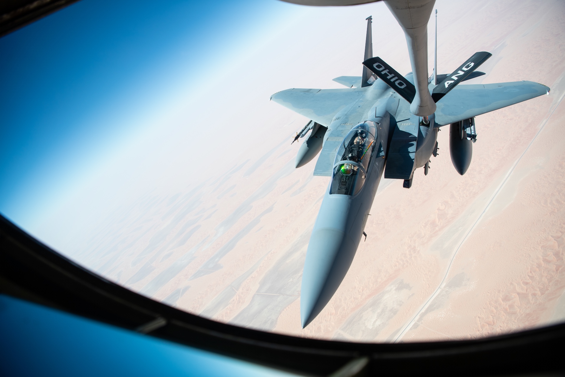 the 50th Expeditionary Air Refueling Squadron conduct aerial refueling missions aboard a U.S. Air Force KC-135 Stratotanker with a Royal Saudi Air Force F-15SA