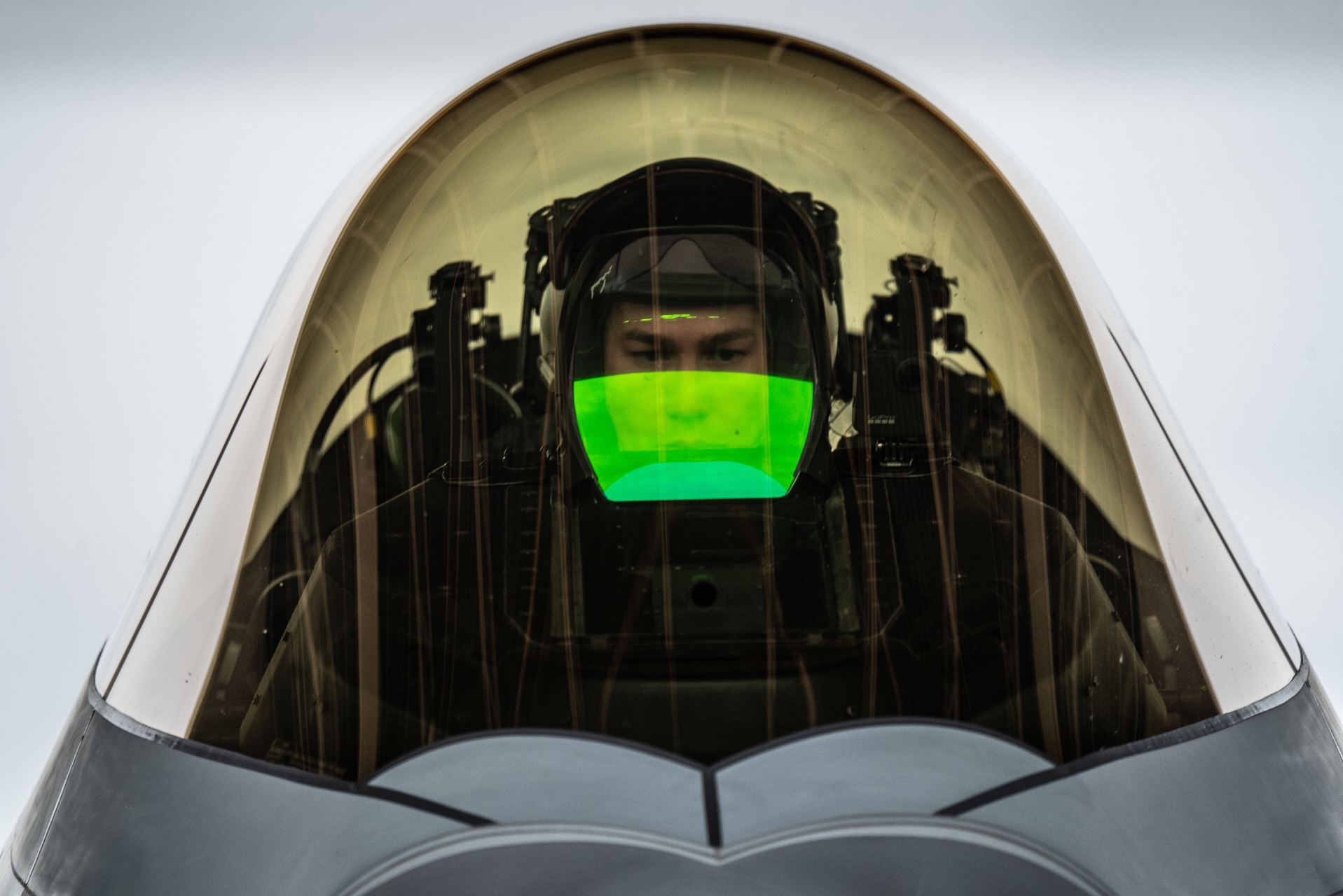 F-22 Raptor Demonstration Team commander and pilot, configures the cockpit of the F-22 Raptor before an aerial demonstration