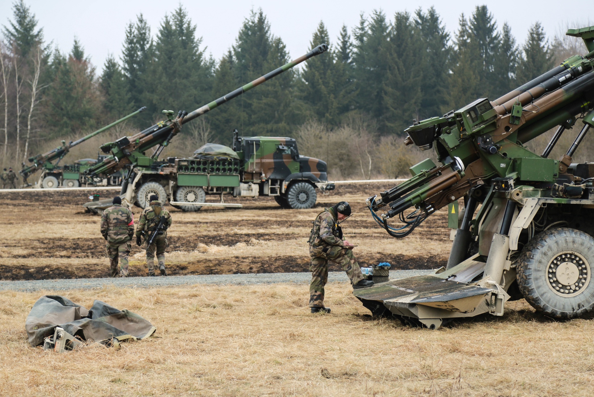French soldiers of the 68th African Artillery Regiment prepare to fire a Caesar 155 mm, 52 caliber wheeled gun during Exercise Dynamic Front 18 at the 7th Army Training Command in Grafenwoehr, Germany