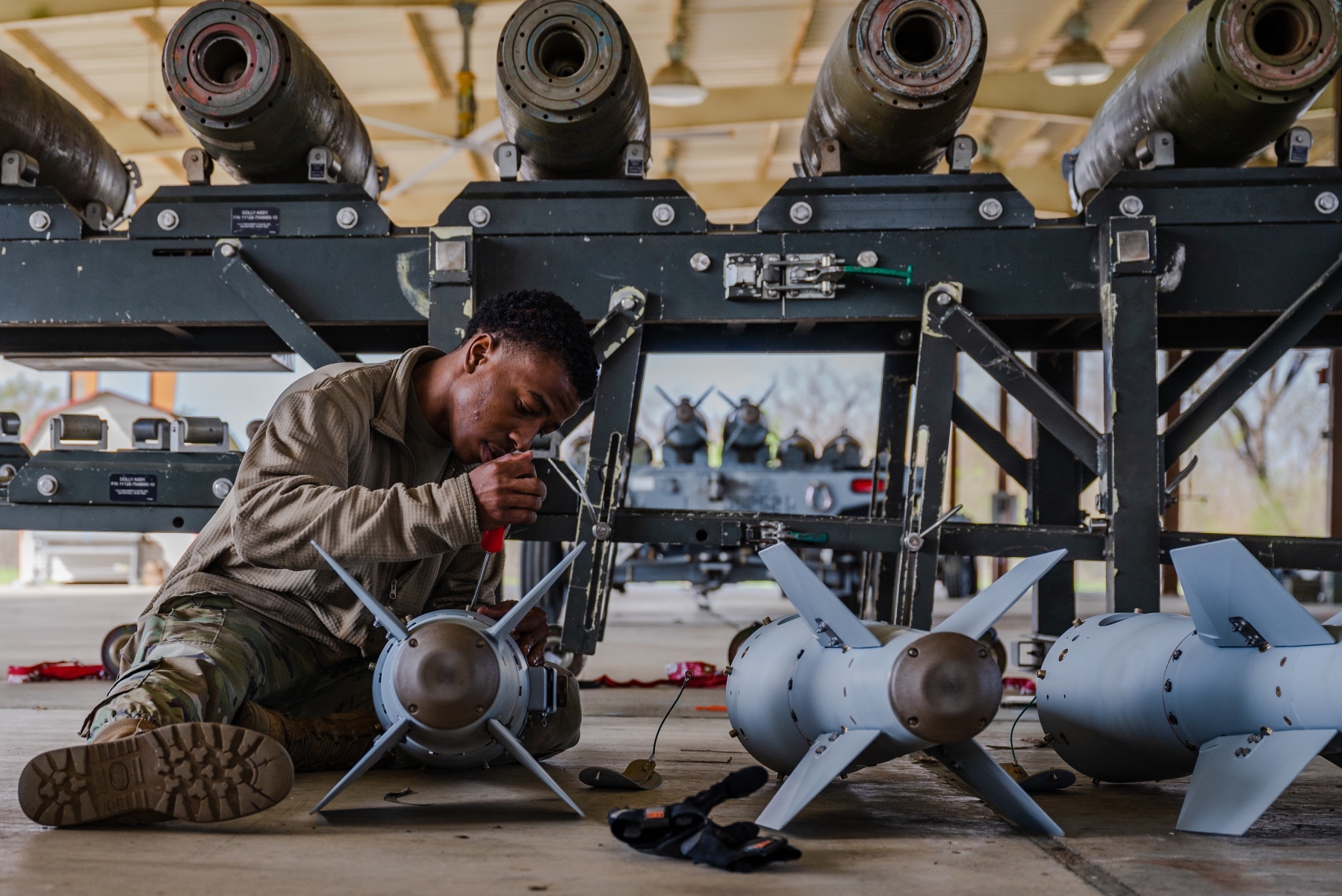 2nd Munitions Squadron conventional maintenance crew member, readies tail kits for installation during 2MUNS CAPEX during a Combat Ammunition Production Exercise at Barksdale Air Force Base