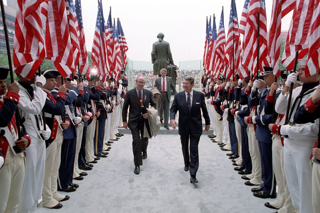 President_Ronald_Reagan_passing_through_a_Military_Honor_Guard_at_Independence_Hall