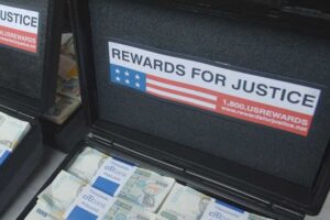 Incentivizing Whistleblowers to Combat Sanctions Evasion