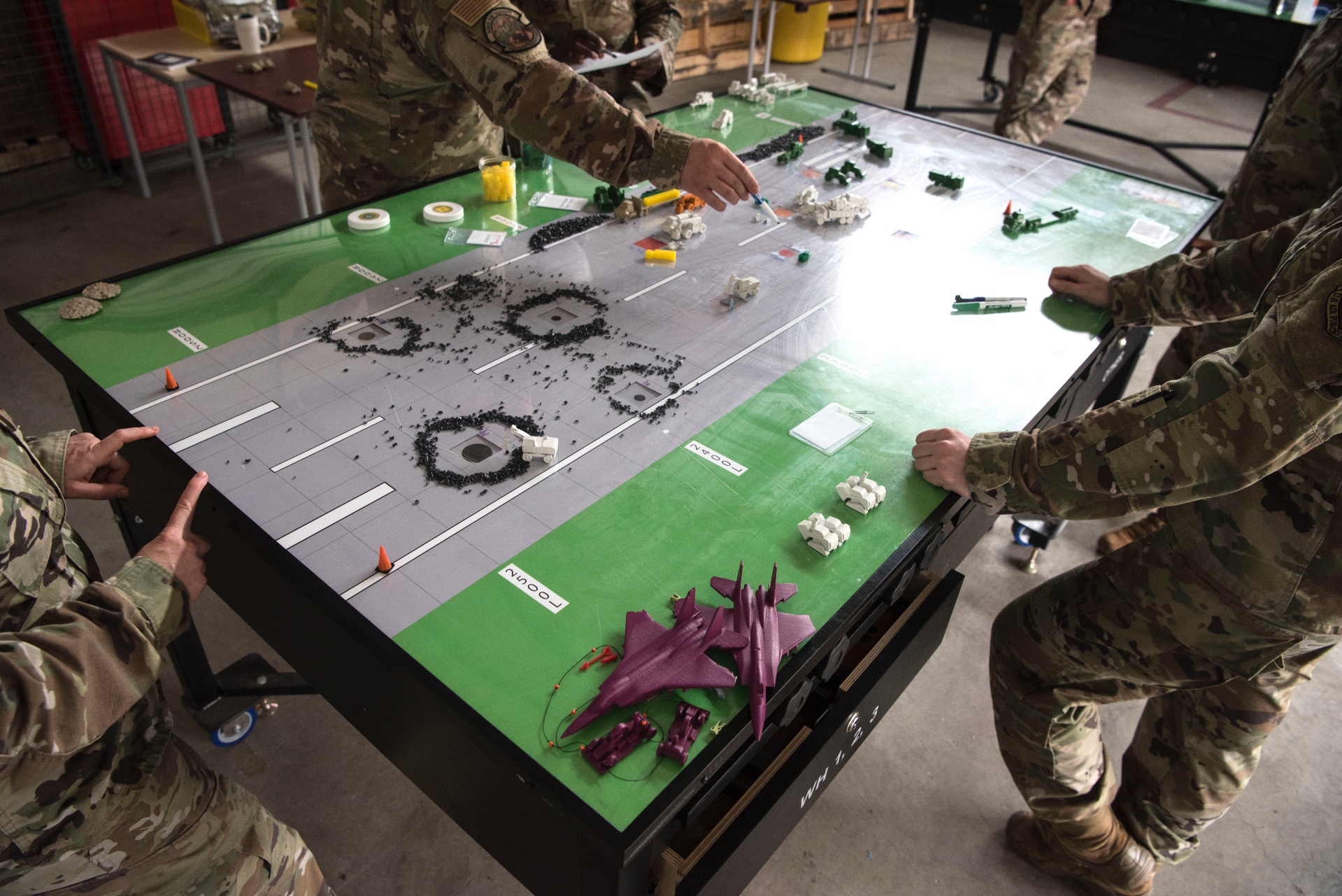 U.S. Air Force Airmen participate in a table top demonstration during Silver Flag at Ramstein Air Base, Germany