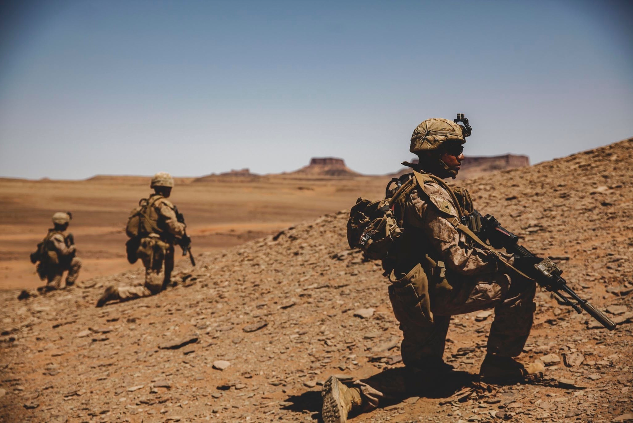 Marines assigned to the 24th Marine Expeditionary Unit (MEU) set security as part of live-fire training during a theater amphibious combat rehearsal (TACR) at Tabuk, Kingdom of Saudi Arabia