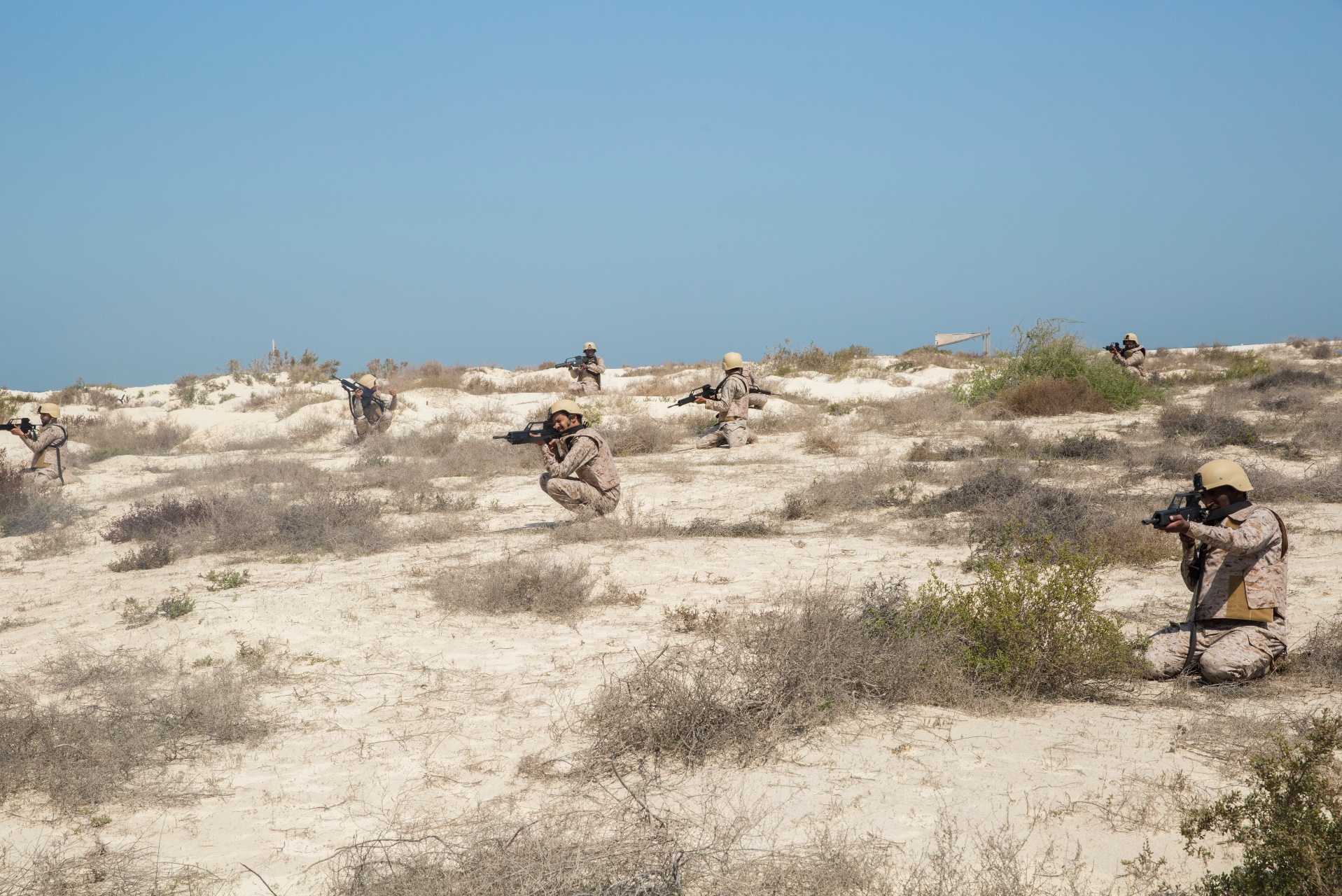 U.S. Marines with Weapons Company, 3rd Battalion, 7th Marine Regiment, Special Purpose Marine Air-Ground Task Force-Crisis Response-Central Command, and Marines of the Royal Saudi Naval Forces stage to conduct a combined squad attack exercise in Saudi Arabia, March 9, 2017