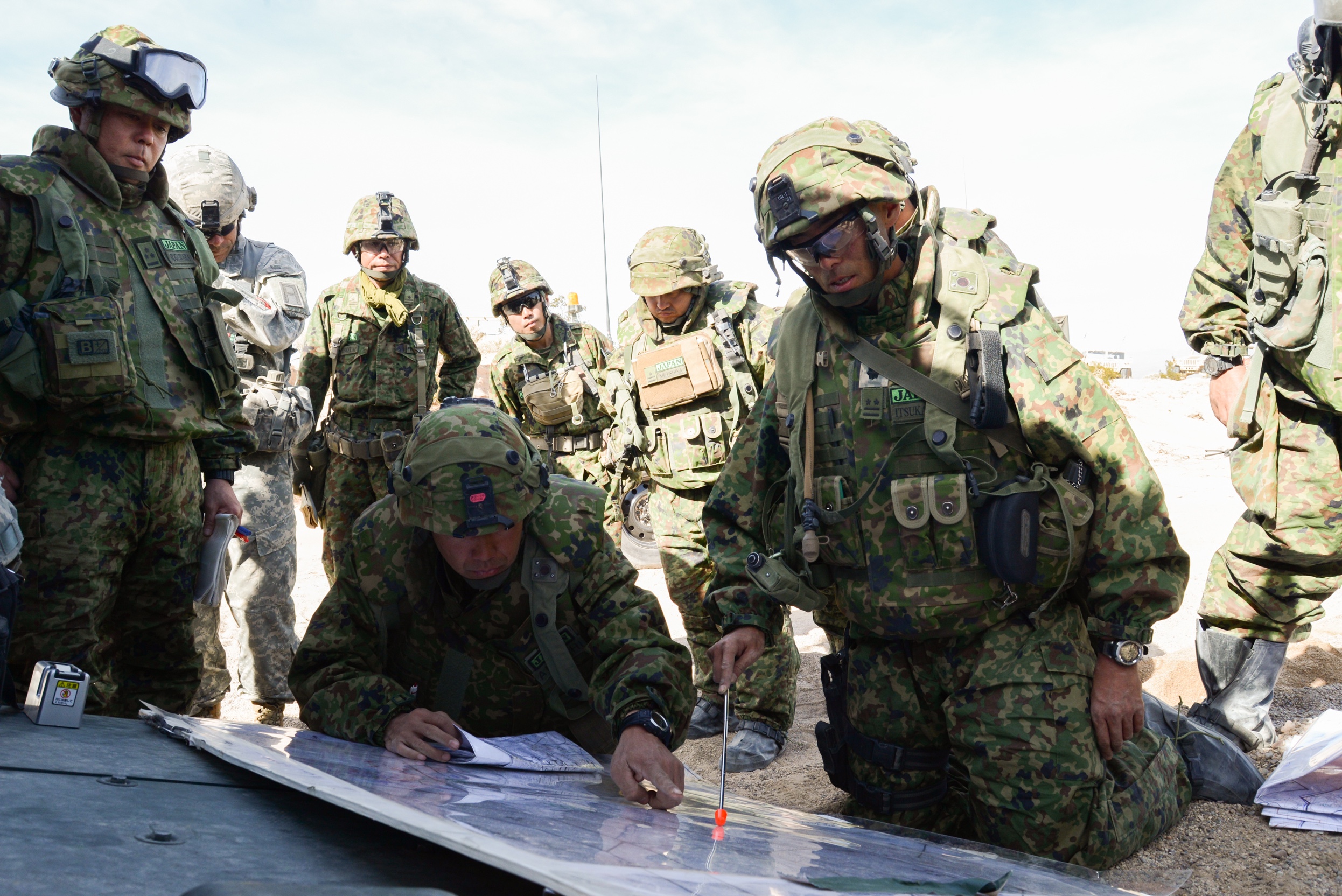 Soldiers from the Japanese Ground Self-Defense Forces train with 3-2 Stryker Brigade Combat Team, 7th Infantry Division, at the National Training Center, Fort Irwin, Calif. during NTC Rotation 14-03, January 2014