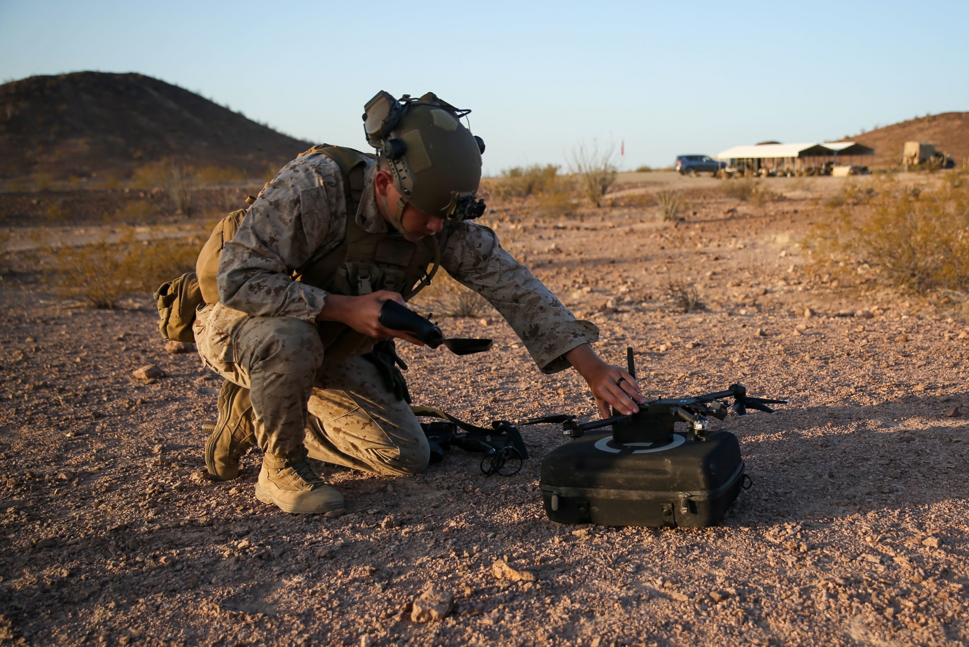 U.S. Marine Corps Lance Cpl. Amadteus Fitzgerald, a native of New Castle, Delaware, and a rifleman with 1st Battalion, 2d Marine Regiment, 2d Marine Division (MARDIV), prepares a Skydio small unmanned aircraft system for flight during Weapons and Tactics Instructor (WTI) course 2-22 at Laguna Army Airfield, Yuma Proving Ground, Arizona, April 4, 2022.
