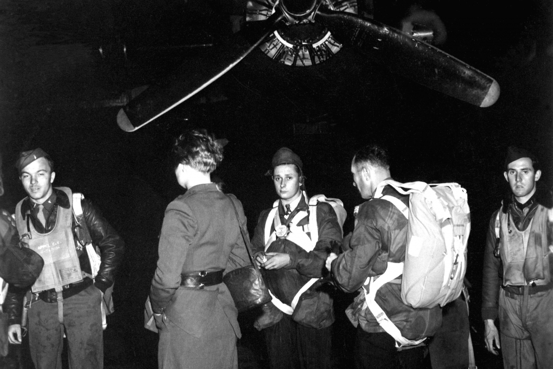 Jedburghs in front of B-24 just before night at Area T, Harrington Airdrome, England.