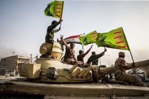 Iraq Between Suits and Fatigues