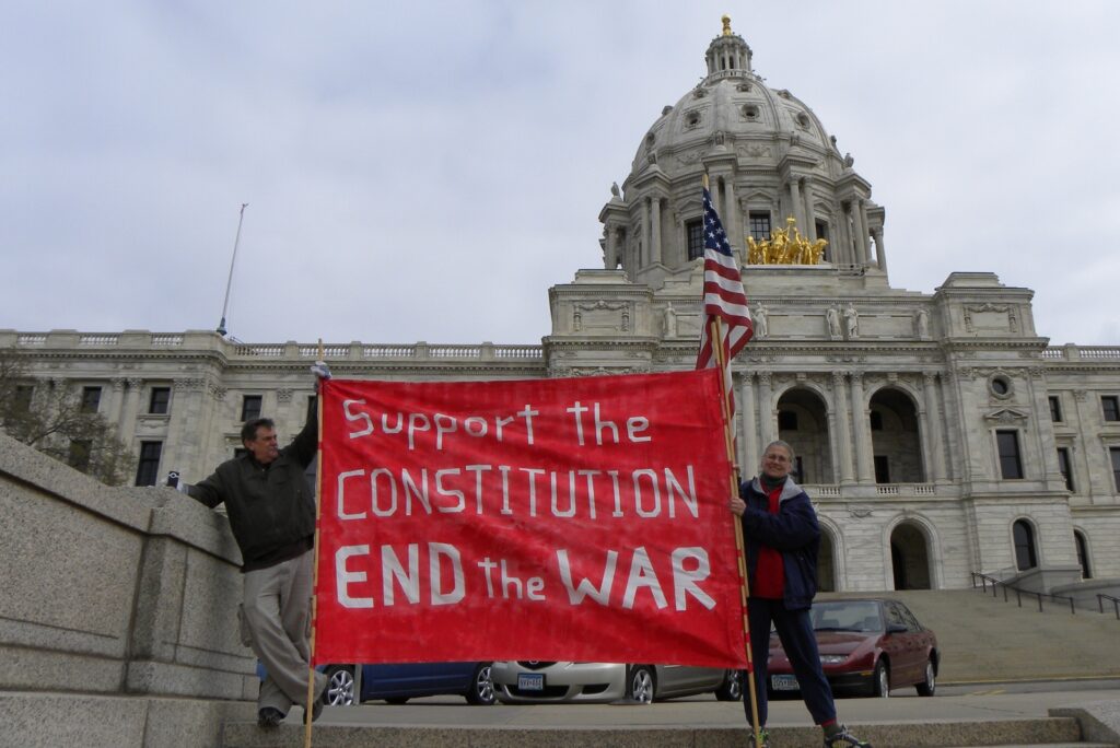 Anti-war_protesters_at_the_Tea_Party_Express_rally_in_Minnesota_(4503391905)
