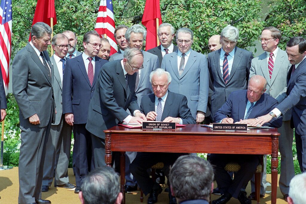President_Ronald_Reagan_during_the_signing_ceremony_for_USSR-US_Nuclear_Risk_Reduction_Centers_Agreement_with_George_Shultz_and_Eduard_Shevardnadze