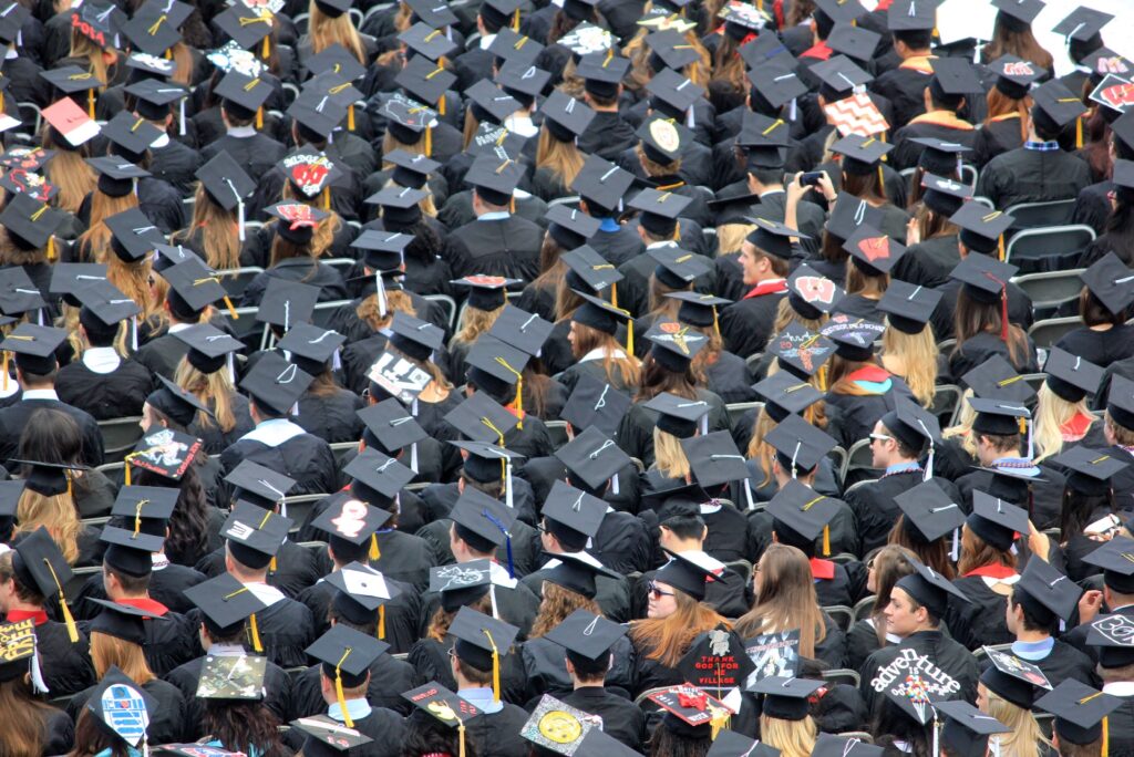 Camp_Randall_Stadium_during_graduation_-_sea_of_graduate_hats