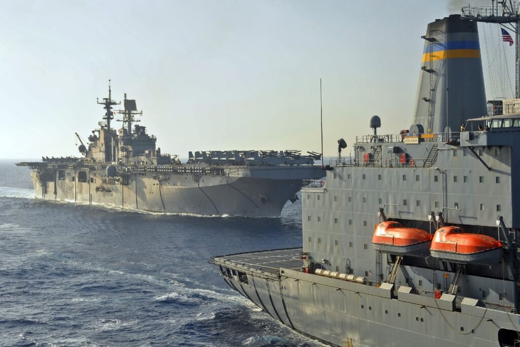 US_Navy_091016-N-1831S-249_The_amphibious_assault_ship_USS_Bataan_(LHD_5)_pulls_alongside_the_Military_Sealift_Command_fleet_replenishment_oiler_USNS_Kanawha_(T-AO_196)_to_conduct_a_replenishment-at-sea