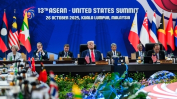 Trump’s Week in Asia: Gifts, Deals, and Submarines