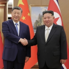 Xi and Kim Meeting Steers Clear of Controversy